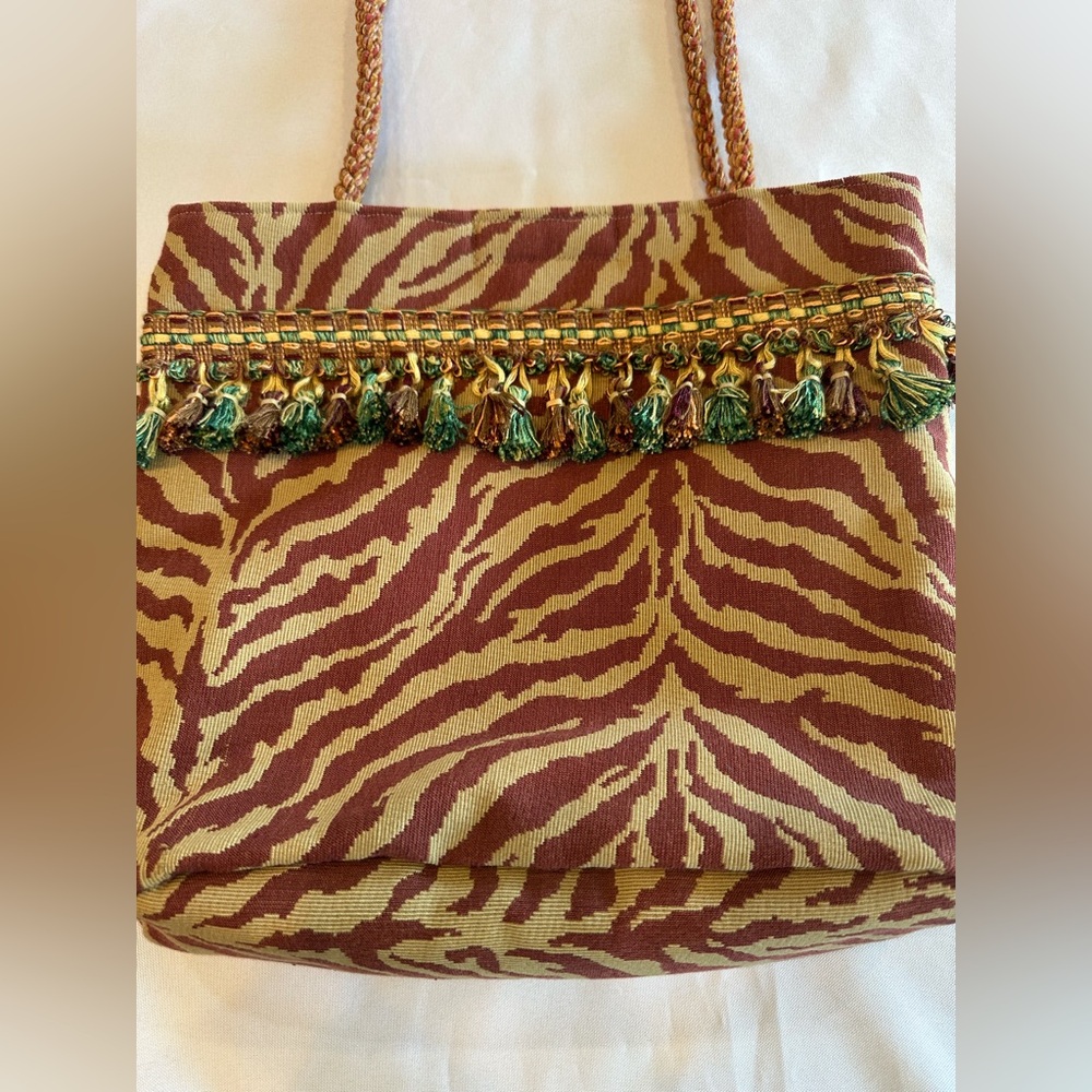 Stylish Maroon and Tan Zebra Tote Bag with Tassel Detail - Picture 2 of 10